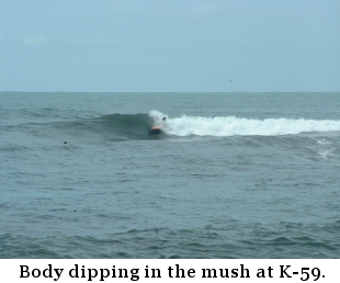 Body dipping in the mush at K-59.